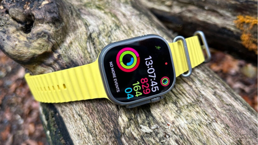 activity watch with yellow band in lifestyle setting